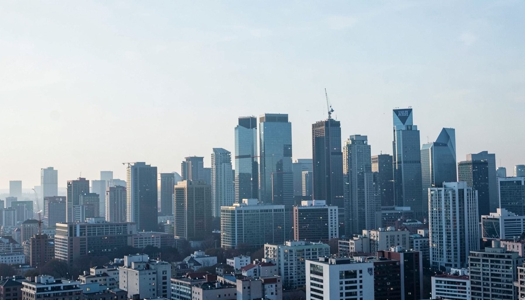 Abstract financial district skyline in muted blues and greys with soft morning light